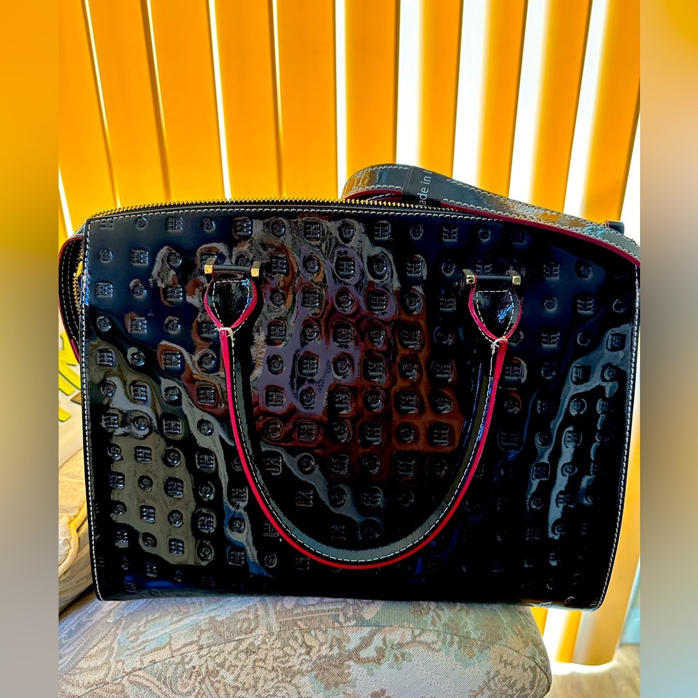 Black patent handbag